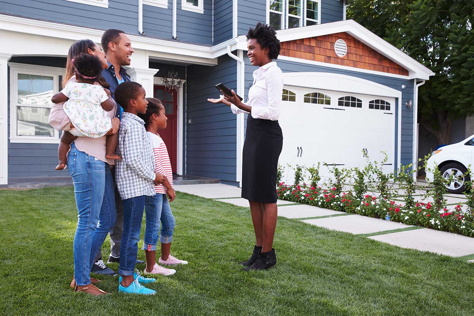 Couple talking to realtor