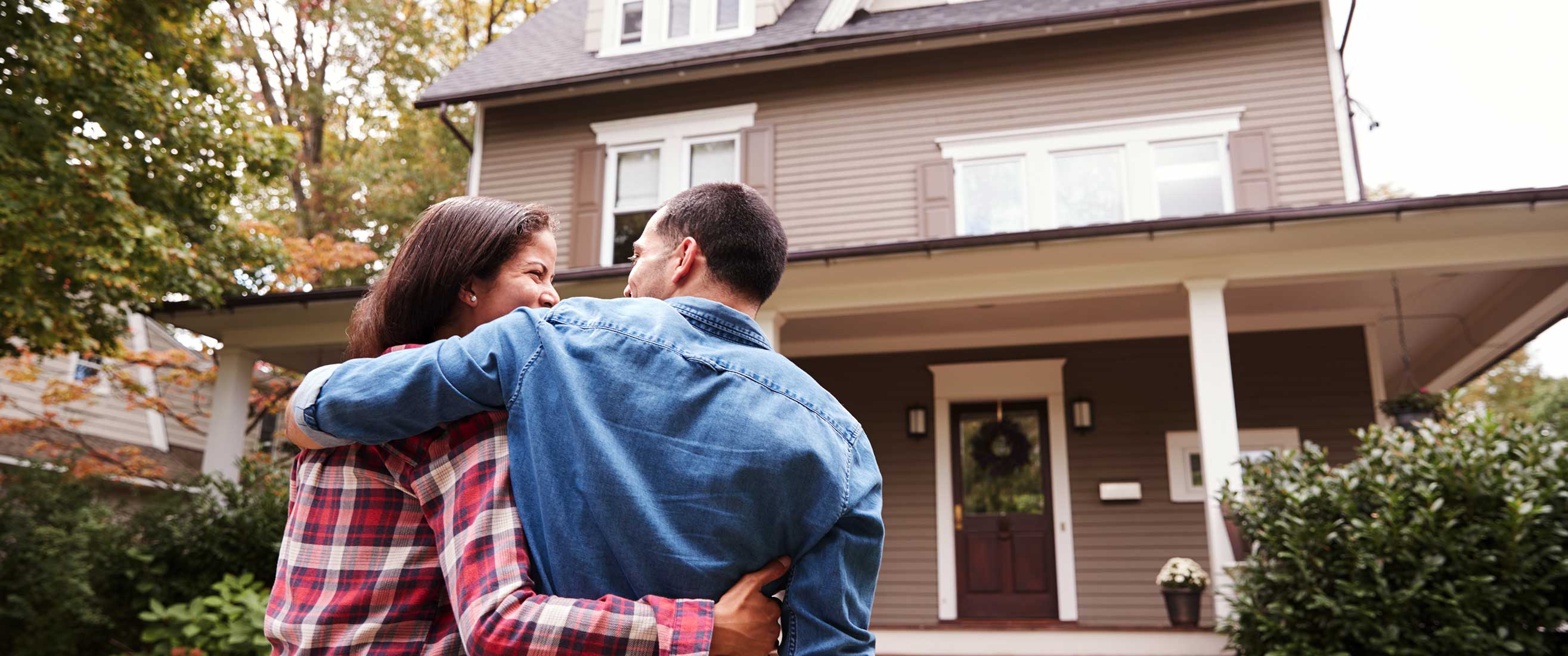 Couple admiring new home